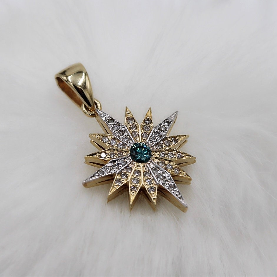 Radiant Star of Bethlehem Pendant in 14k Gold with White and Blue Diamonds
