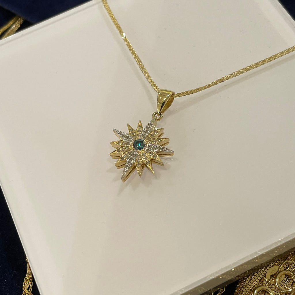Radiant Star of Bethlehem Pendant in 14k Gold with White and Blue Diamonds