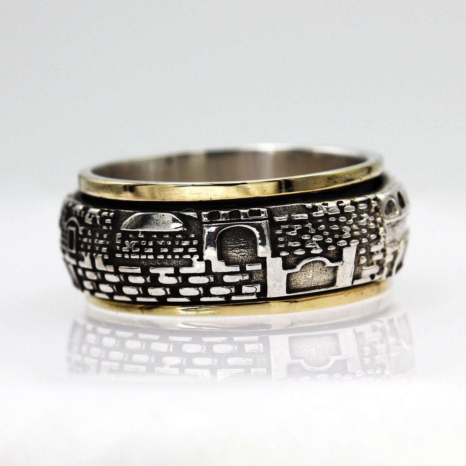 Handmade 14k Gold and Silver Jerusalem Turning Ring