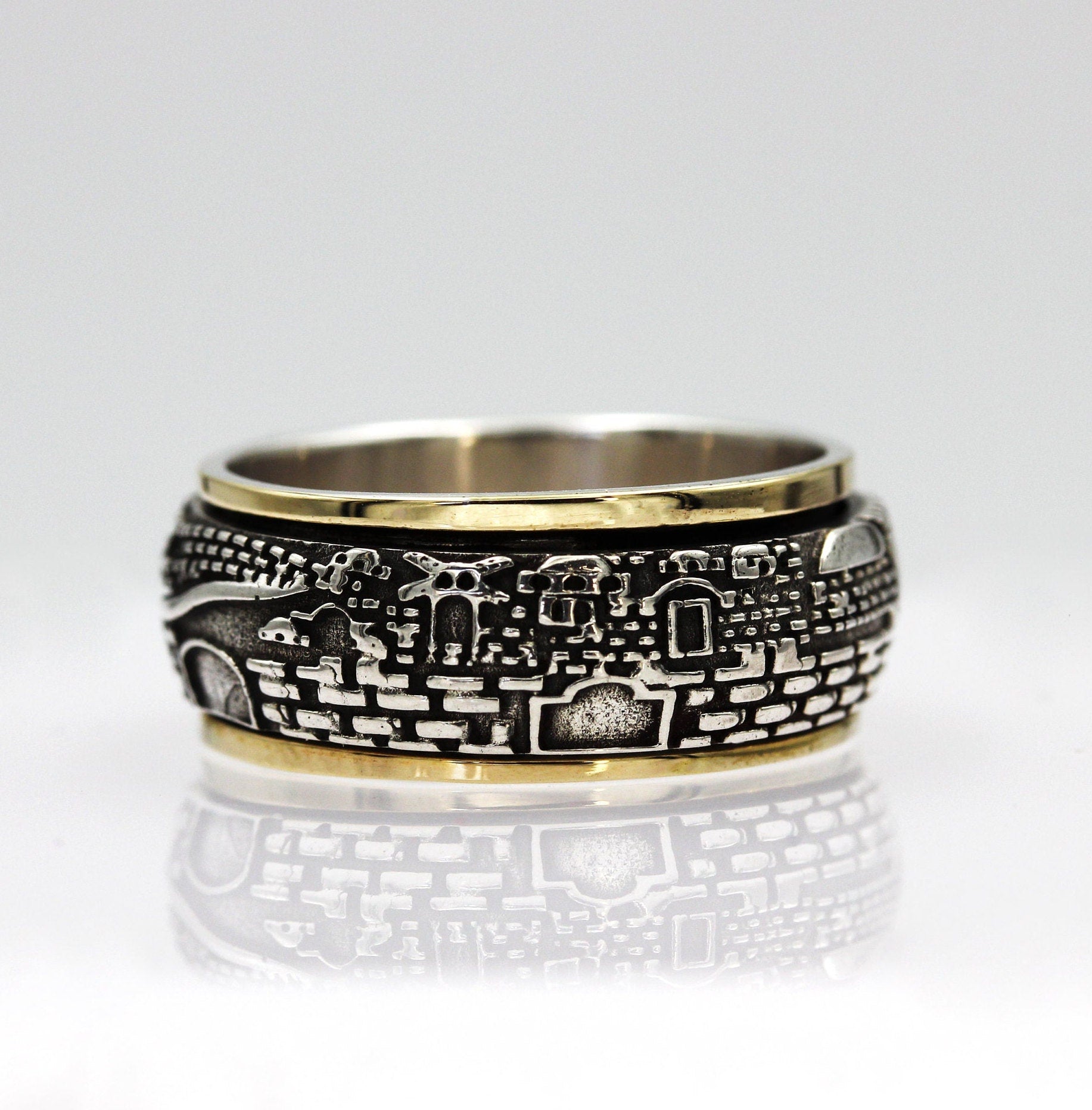 Handmade 14k Gold and Silver Jerusalem Turning Ring