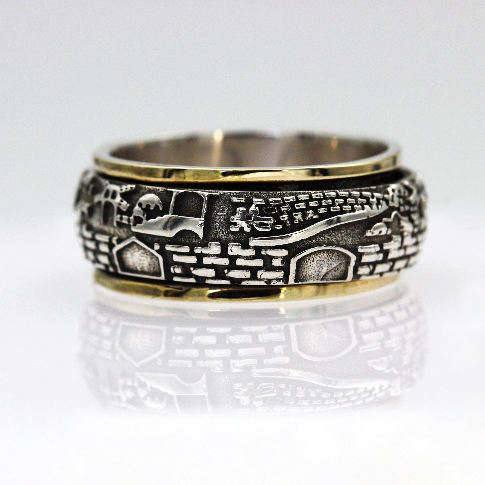 Handmade 14k Gold and Silver Jerusalem Turning Ring
