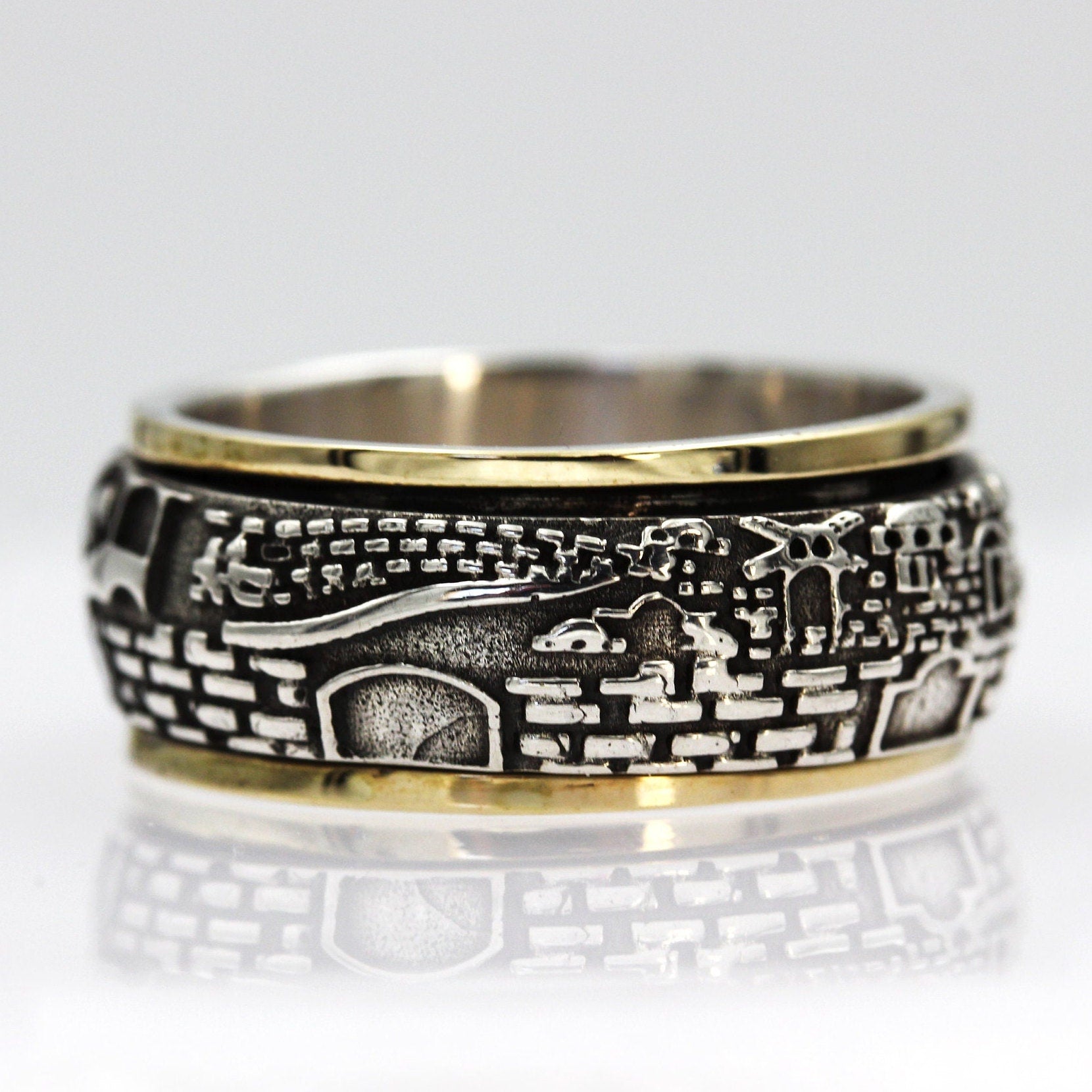 Handmade 14k Gold and Silver Jerusalem Turning Ring