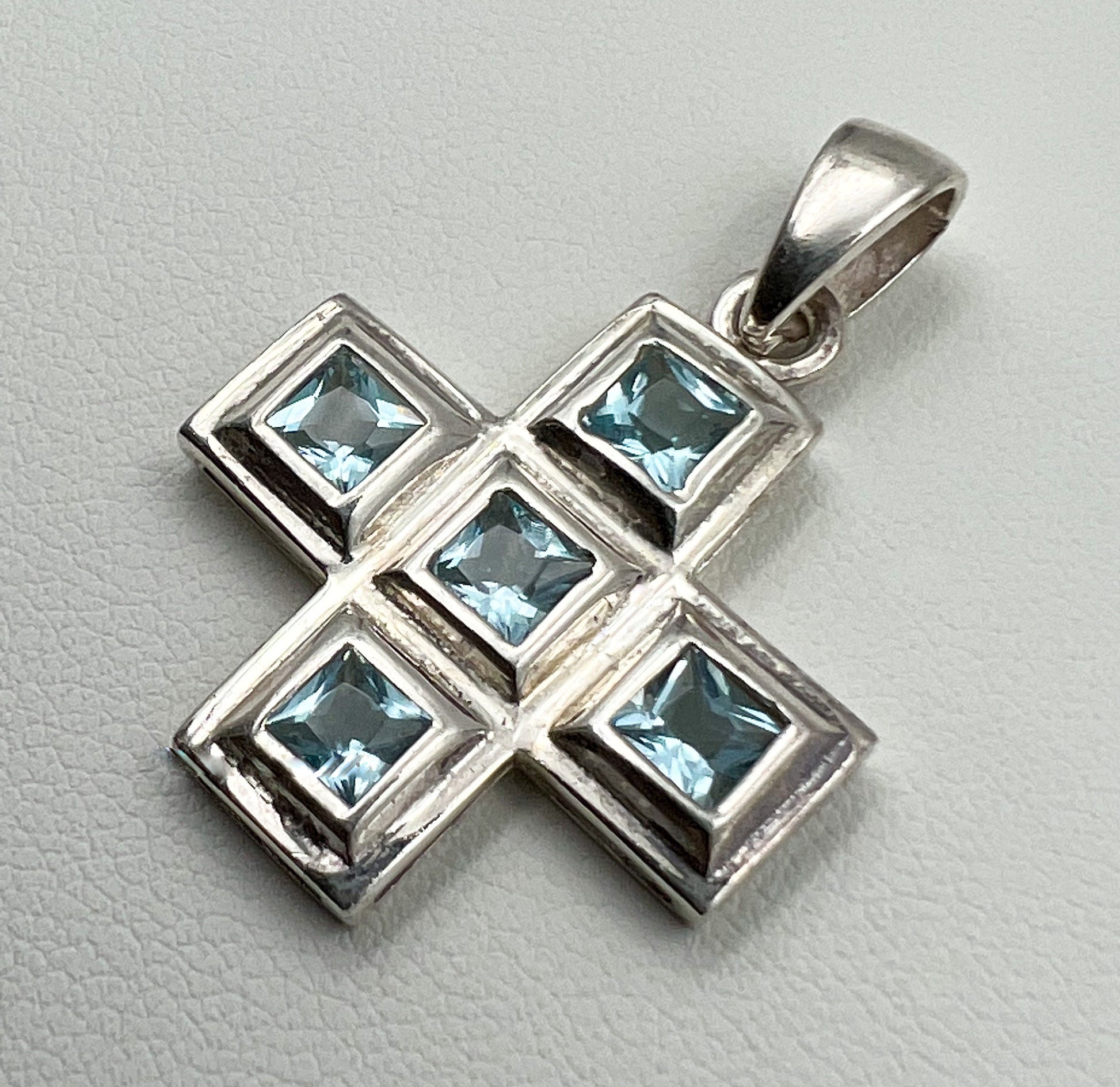 Sacred Serenity Cross Pendant in Sterling Silver with Aquamarine Sparkle