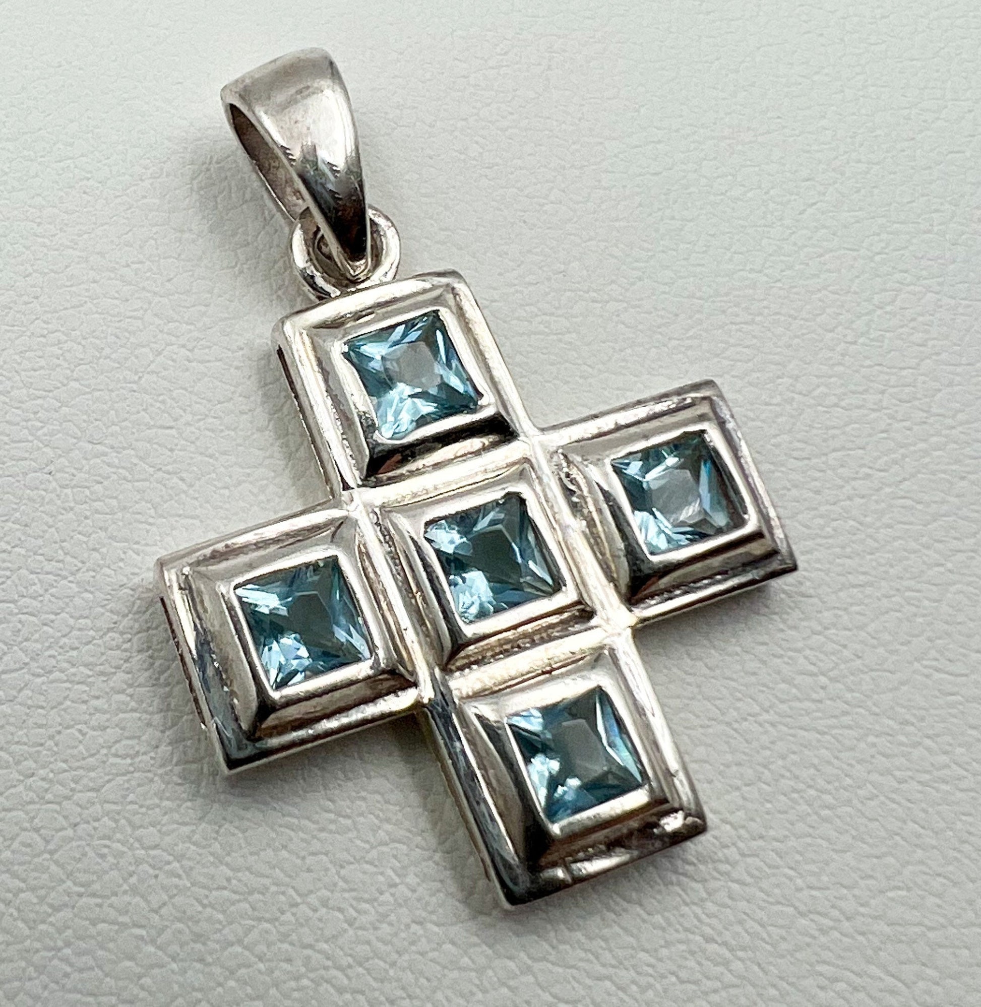 Sacred Serenity Cross Pendant in Sterling Silver with Aquamarine Sparkle