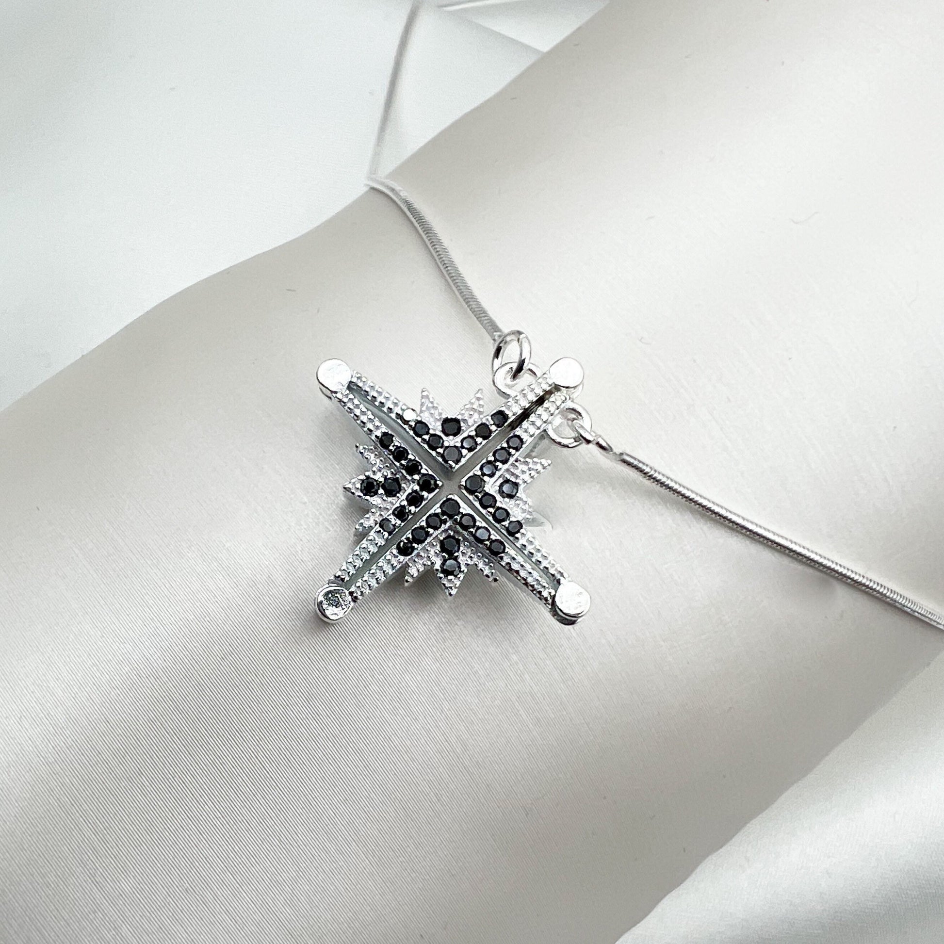 Star of Bethlehem Opening Pendant in Sterling Silver with Black Onyx