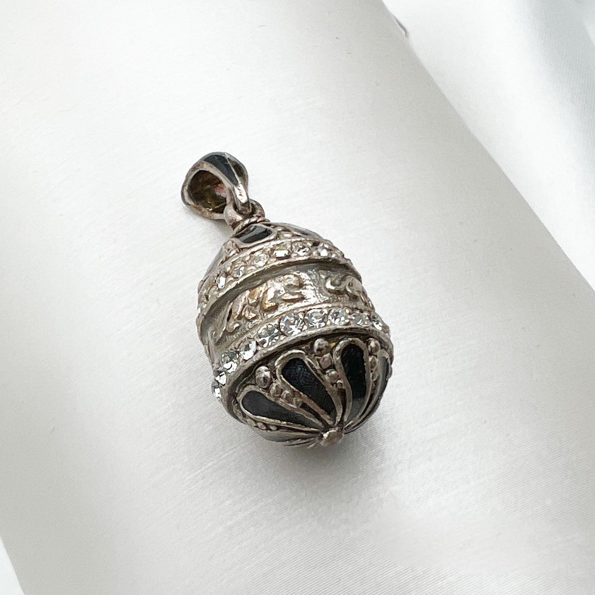 Elegant Black and Silver Blessing Egg Pendant with Sparkling Zircons