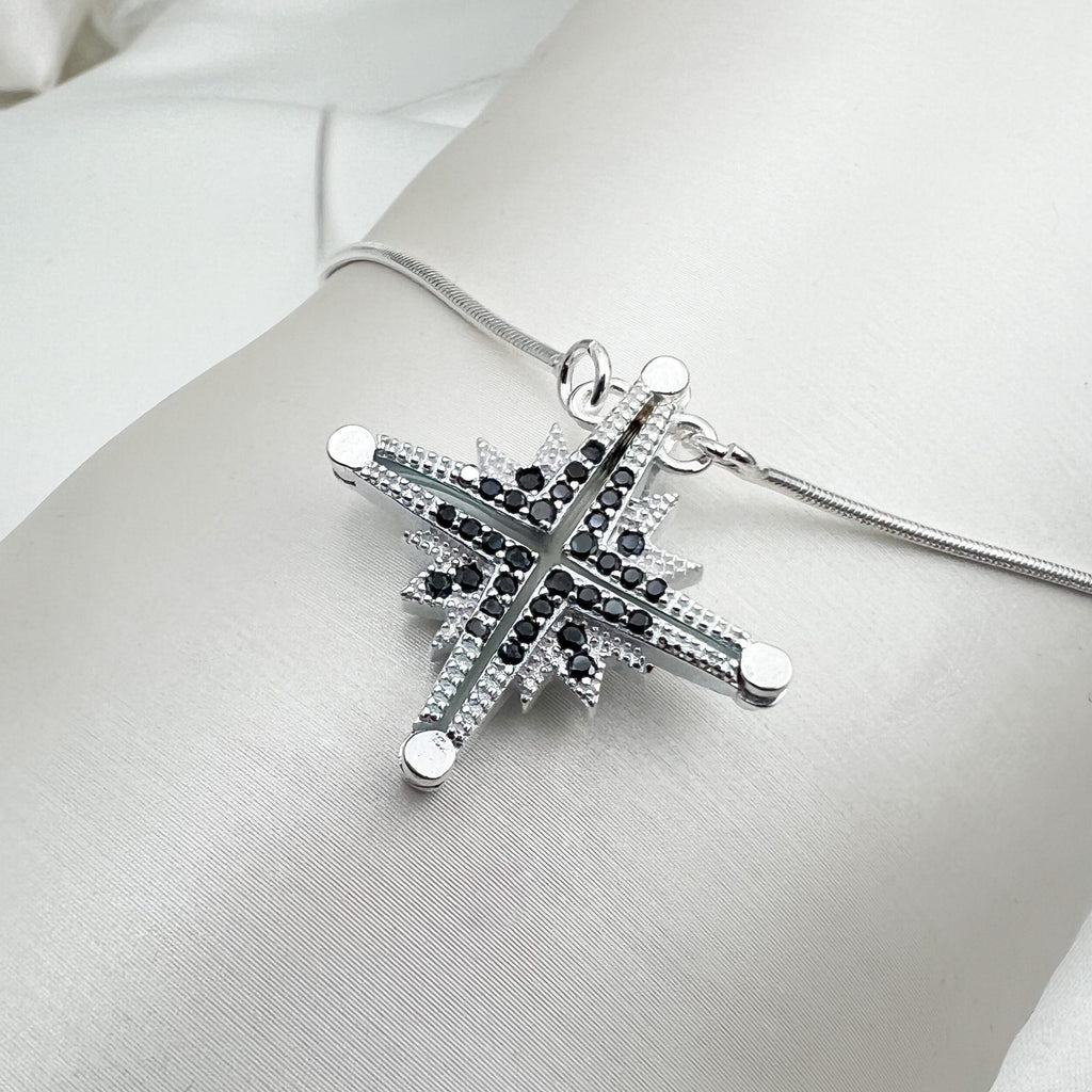Star of Bethlehem Opening Pendant in Sterling Silver with Black Onyx