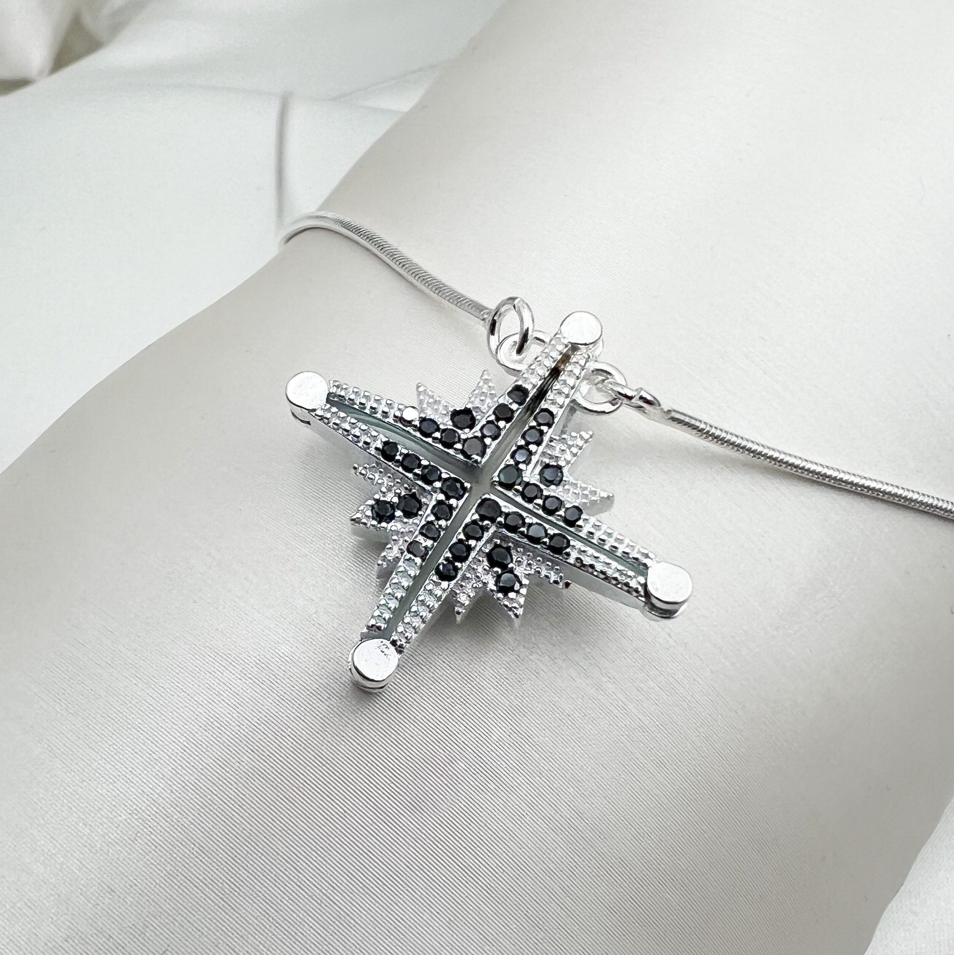 Star of Bethlehem Opening Pendant in Sterling Silver with Black Onyx
