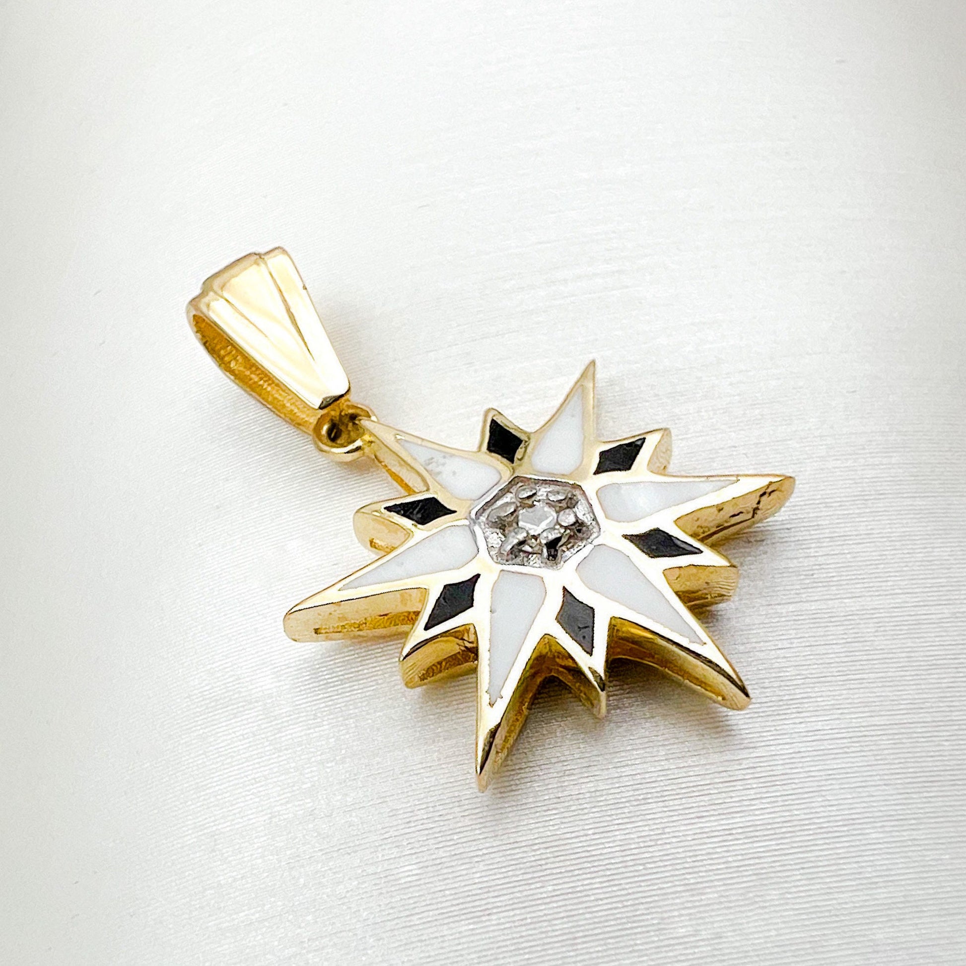 Elegant Star of Bethlehem Pendant in 14k Gold with Diamond Accents and Enamel