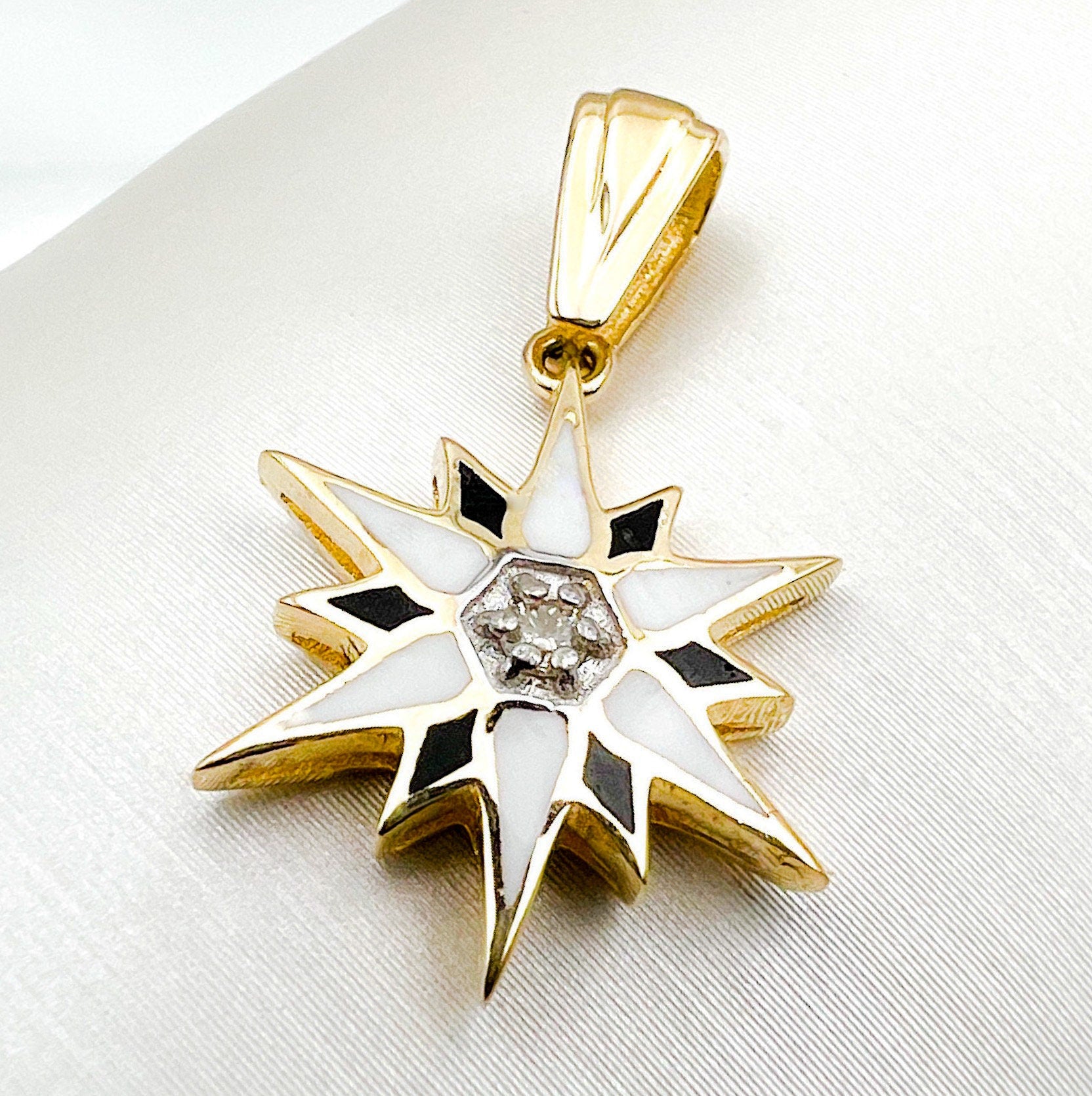 Elegant Star of Bethlehem Pendant in 14k Gold with Diamond Accents and Enamel