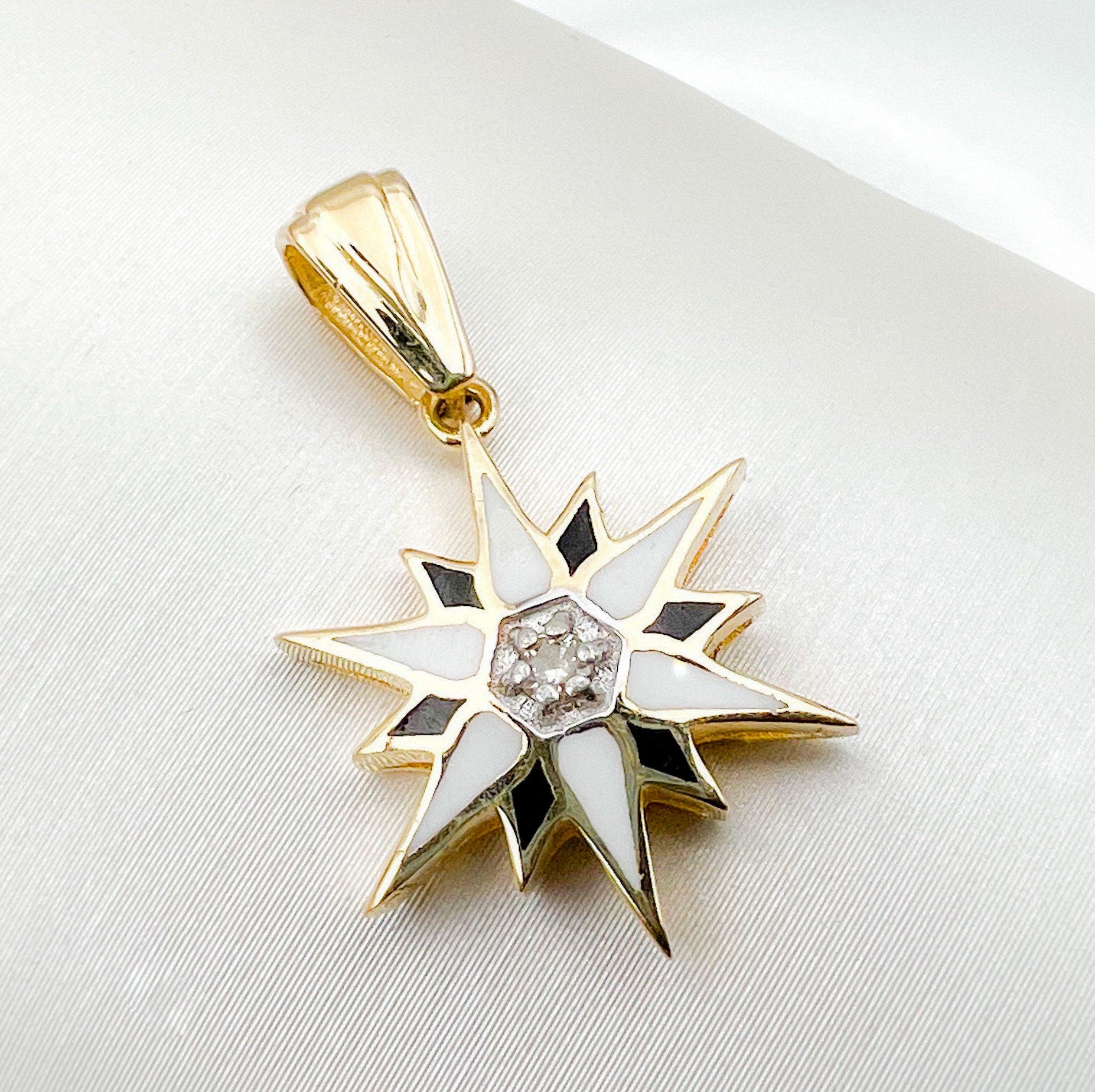 Elegant Star of Bethlehem Pendant in 14k Gold with Diamond Accents and Enamel