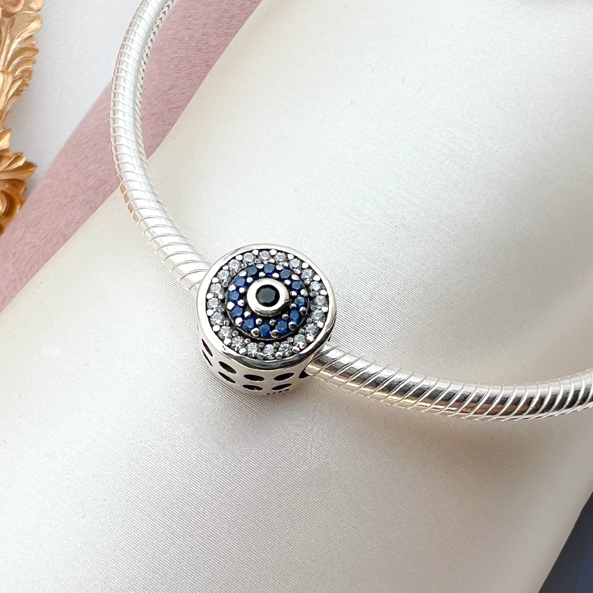 Elegant 925 Silver Evil Eye Charm with Blue Sapphire Accents for Bracelet Lovers