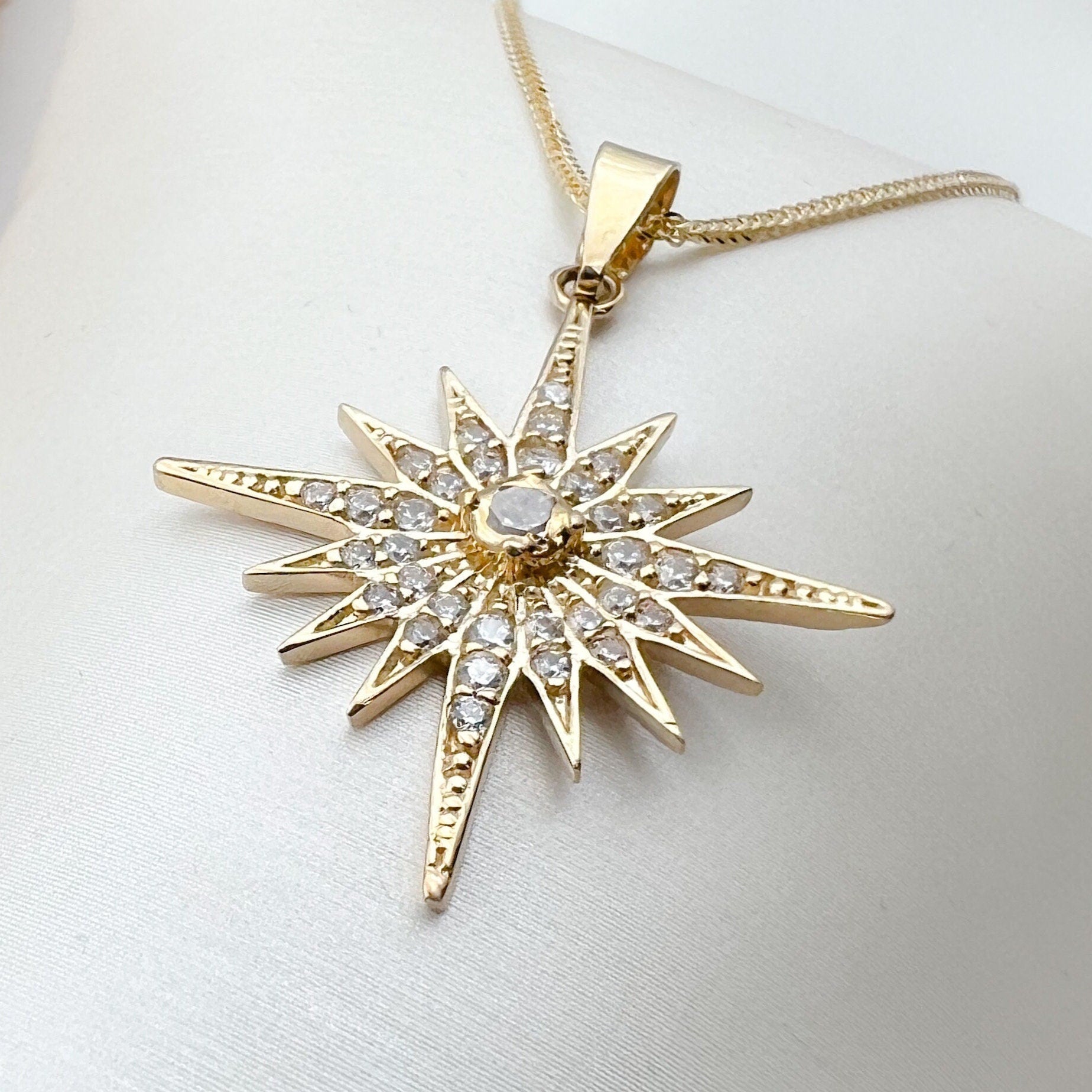 Elegant 14k Gold Star of Bethlehem Pendant with White Zircons and Gold Chain