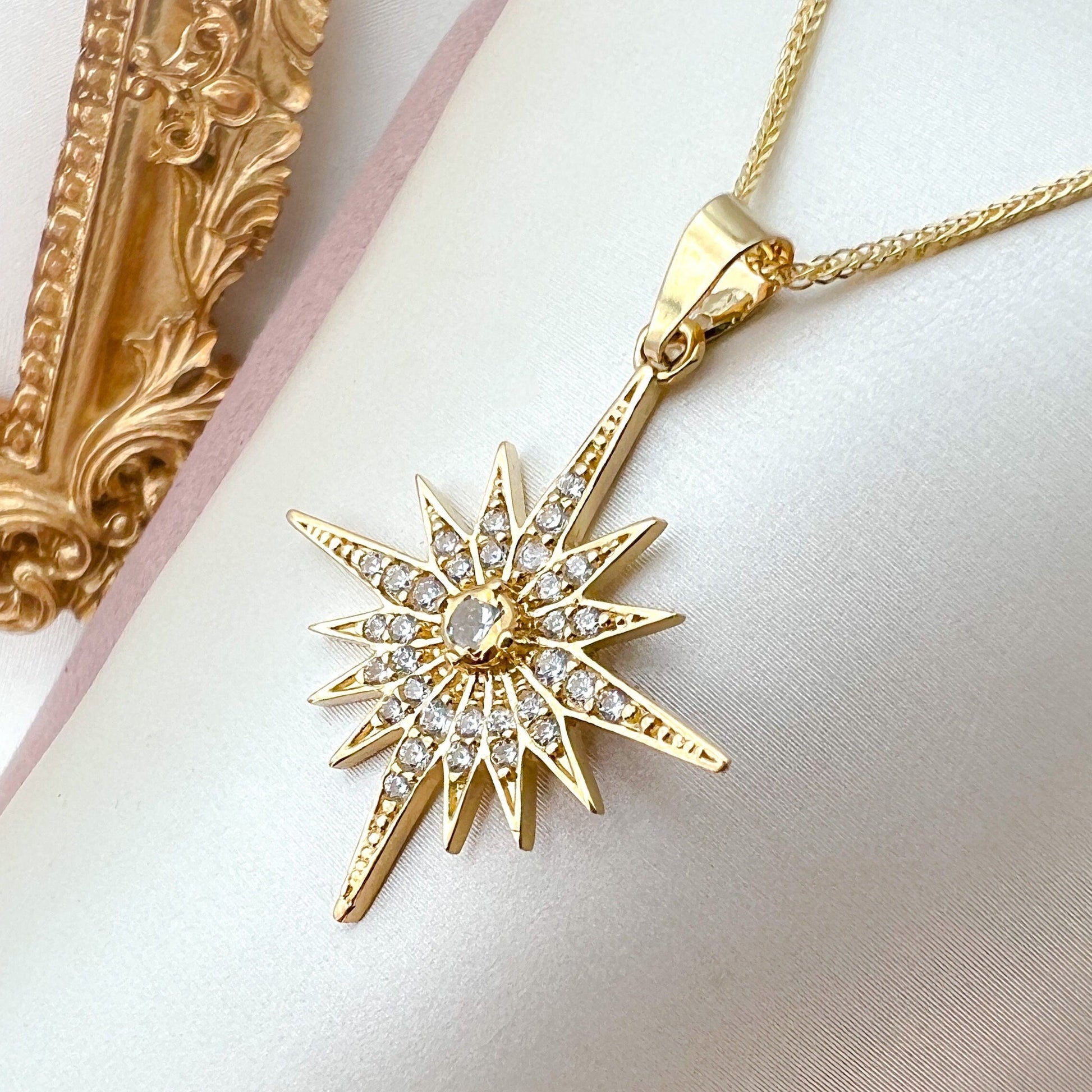 Elegant 14k Gold Star of Bethlehem Pendant with White Zircons and Gold Chain