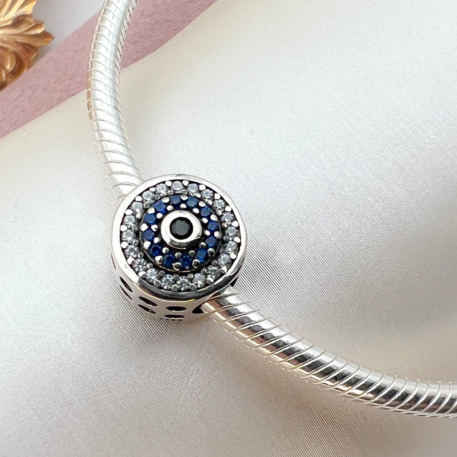 Elegant 925 Silver Evil Eye Charm with Blue Sapphire Accents for Bracelet Lovers