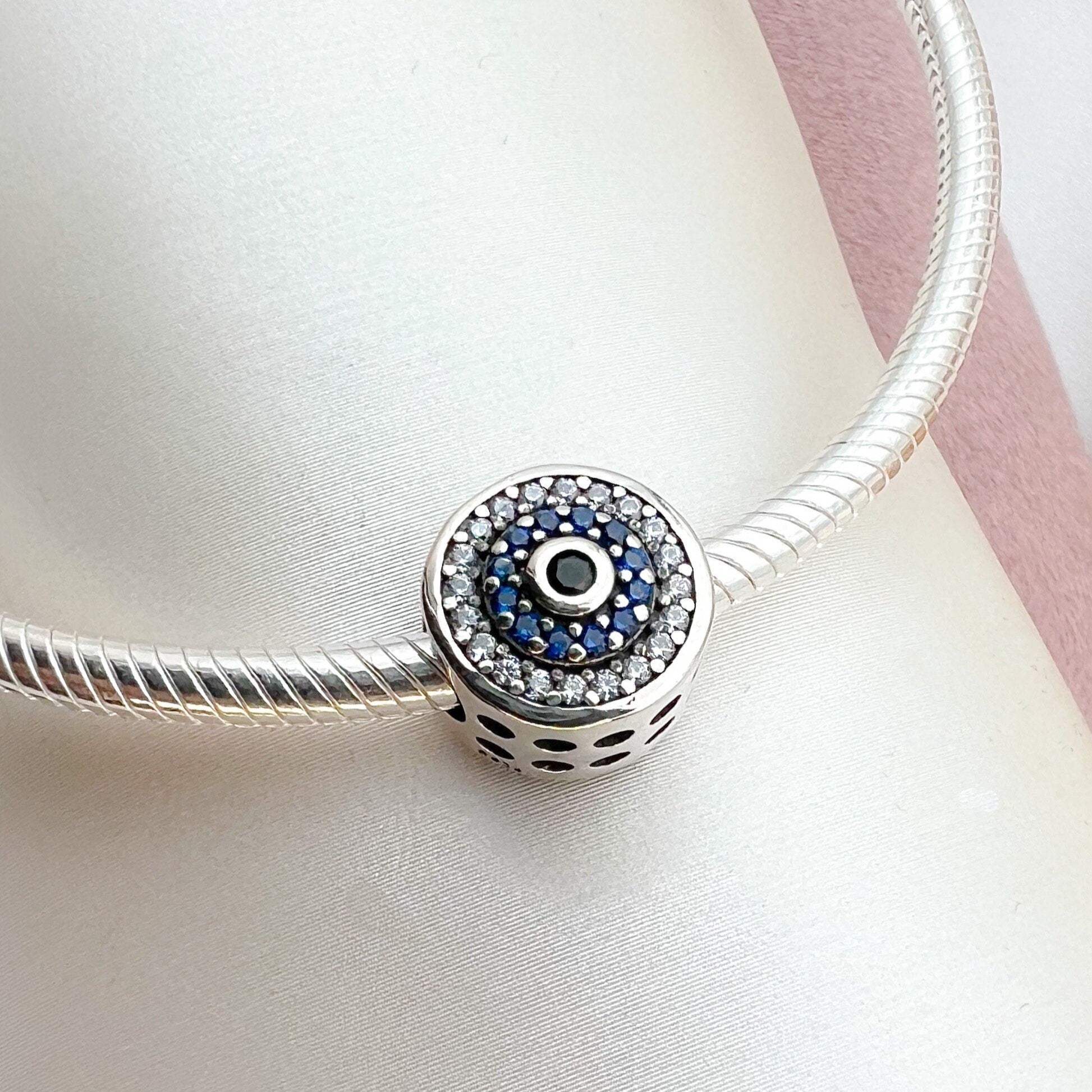 Elegant 925 Silver Evil Eye Charm with Blue Sapphire Accents for Bracelet Lovers