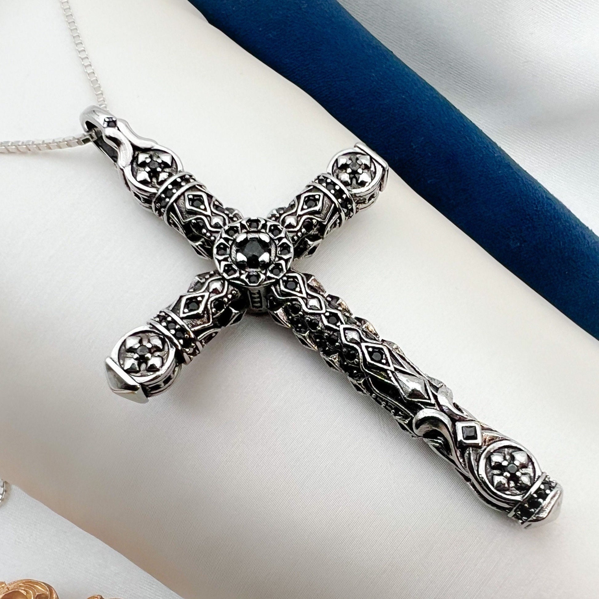 Intricate Sterling Silver Cross Pendant with Onyx Accents