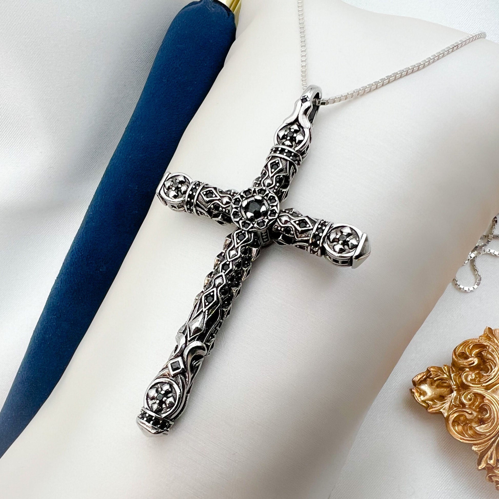 Intricate Sterling Silver Cross Pendant with Onyx Accents