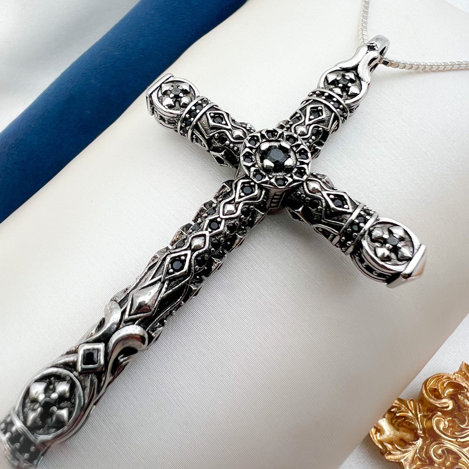 Intricate Sterling Silver Cross Pendant with Onyx Accents
