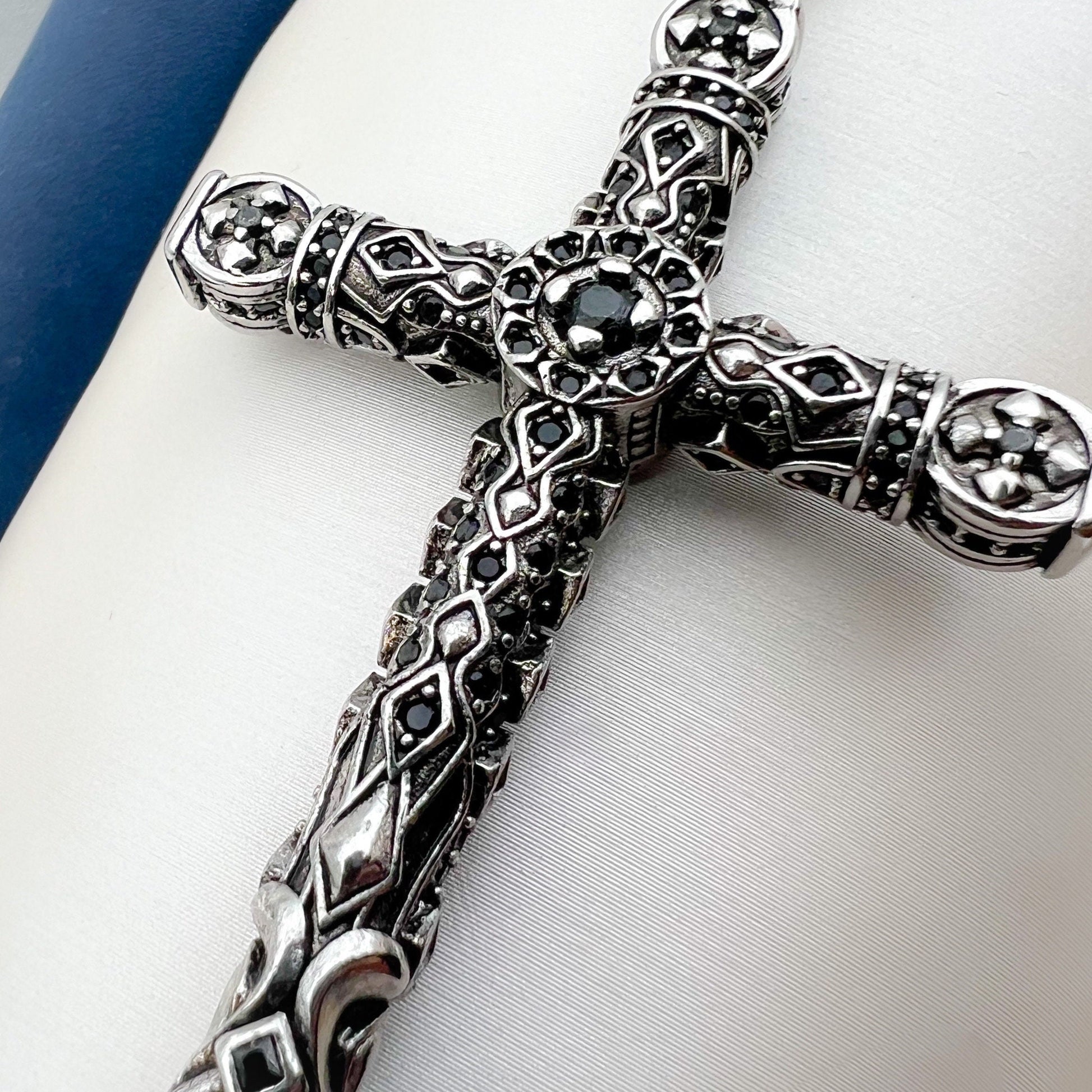 Intricate Sterling Silver Cross Pendant with Onyx Accents